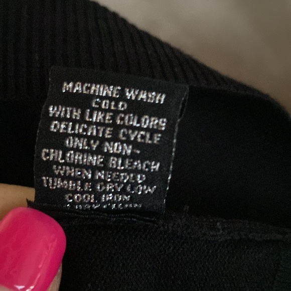 Black sweater with black and white striped sleeves. Great condition. - Picture 7 of 7